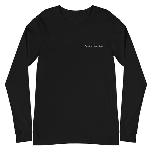 *not a tourist Unisex Long Sleeve Tee (left)
