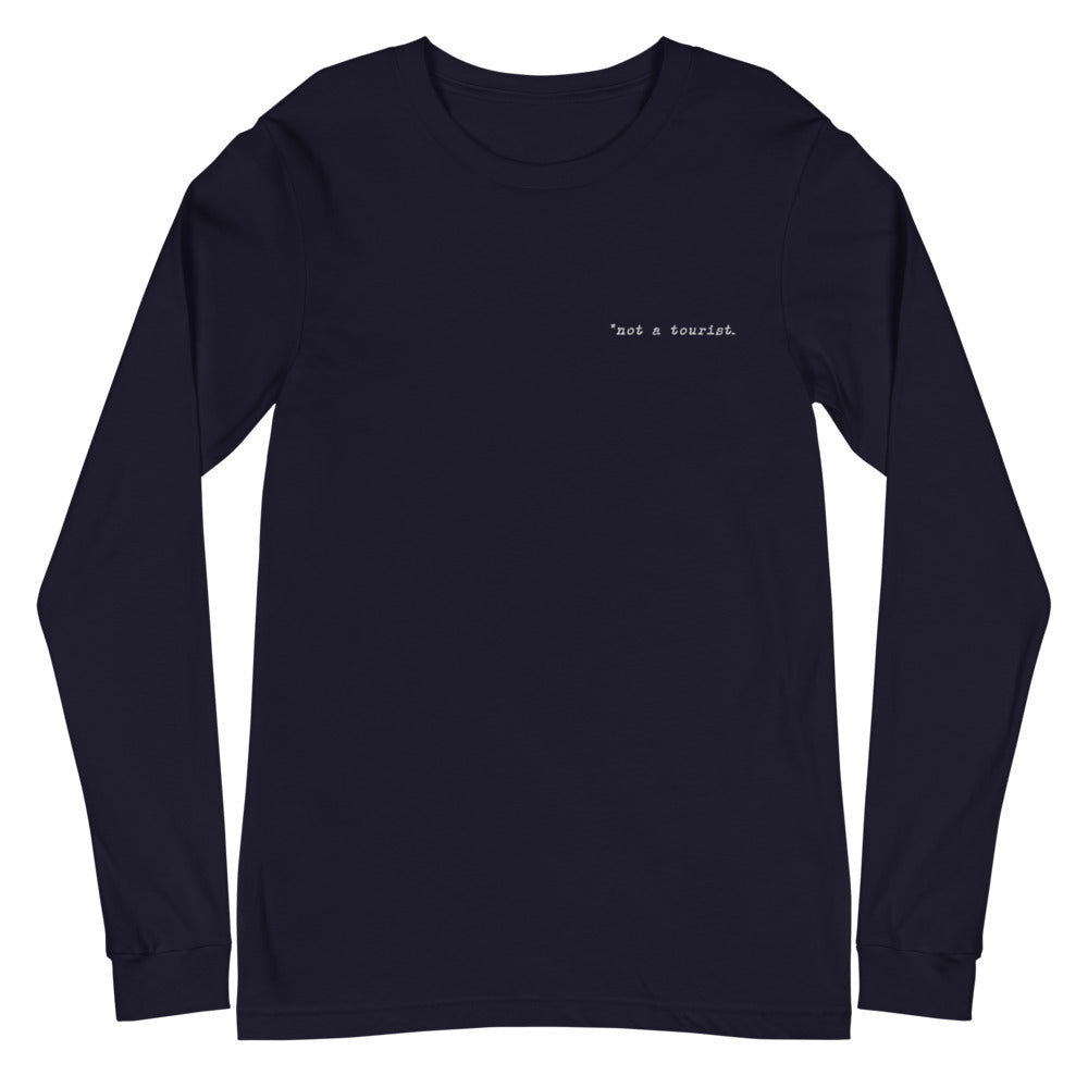 *not a tourist Unisex Long Sleeve Tee (left)