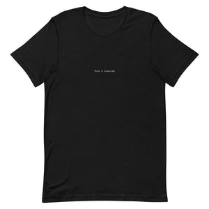 *not a tourist Short-Sleeve Unisex T-Shirt (center)