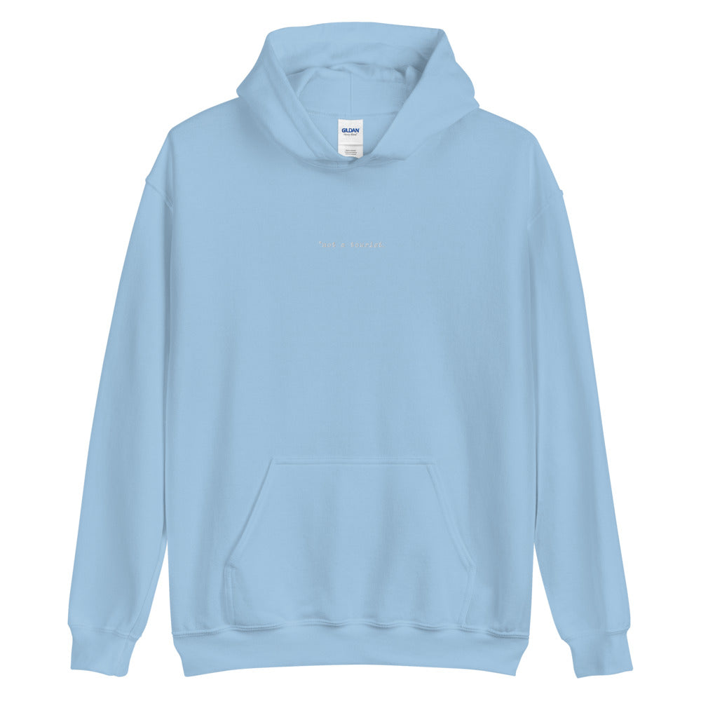 *not a tourist Hoodie (Unisex)