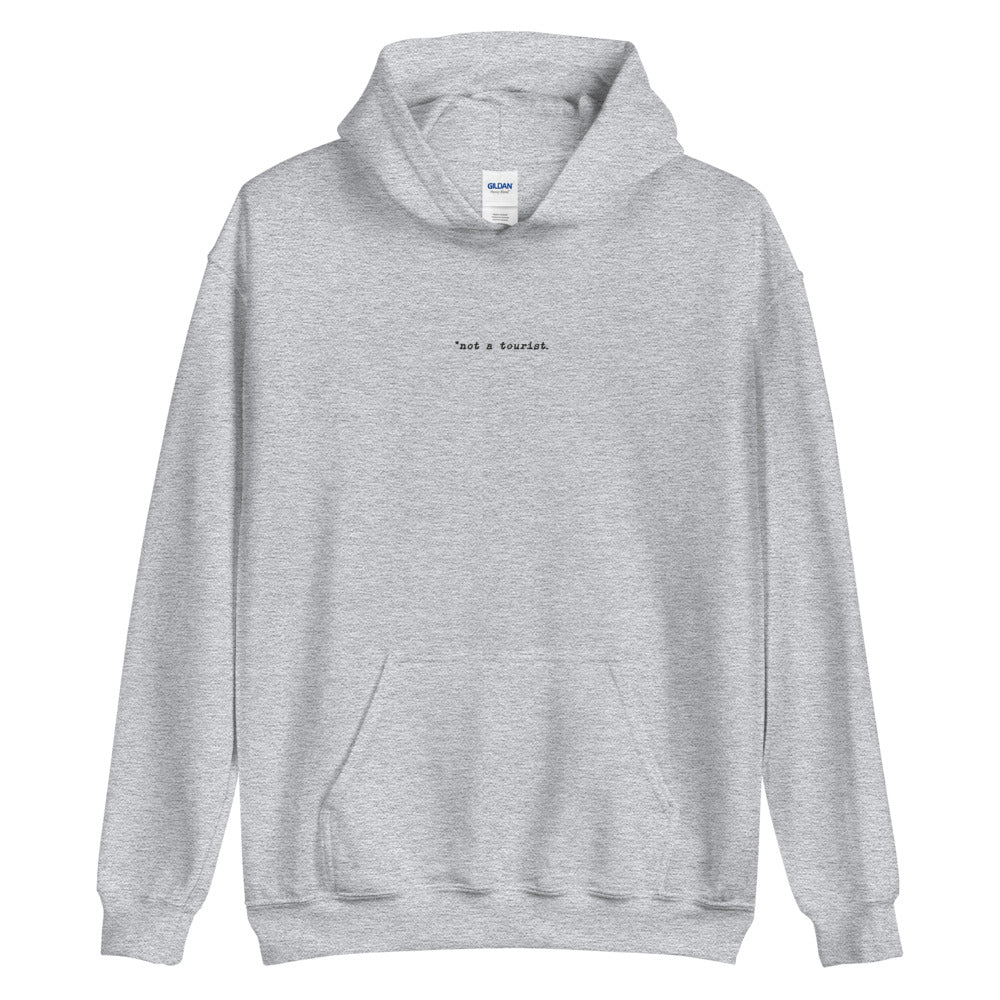 *not a tourist Hoodie (Unisex)