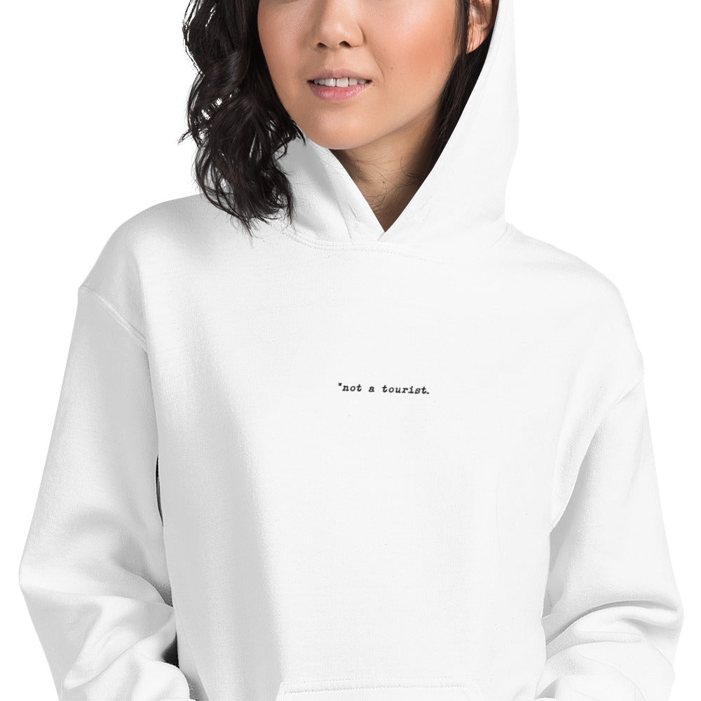 *not a tourist Hoodie (Unisex)